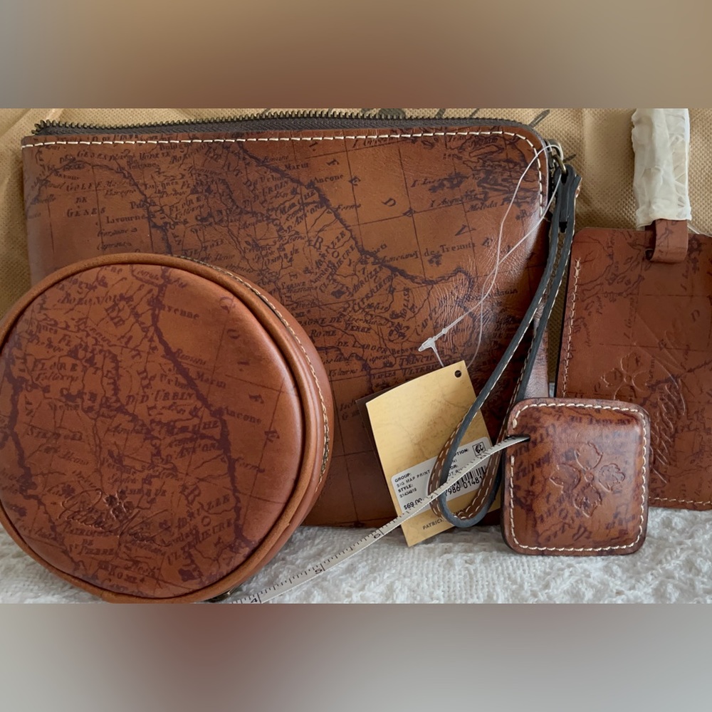 Patricia Nash signed wristlet, jewelry case, tape measure, and luggage tag (ALL)